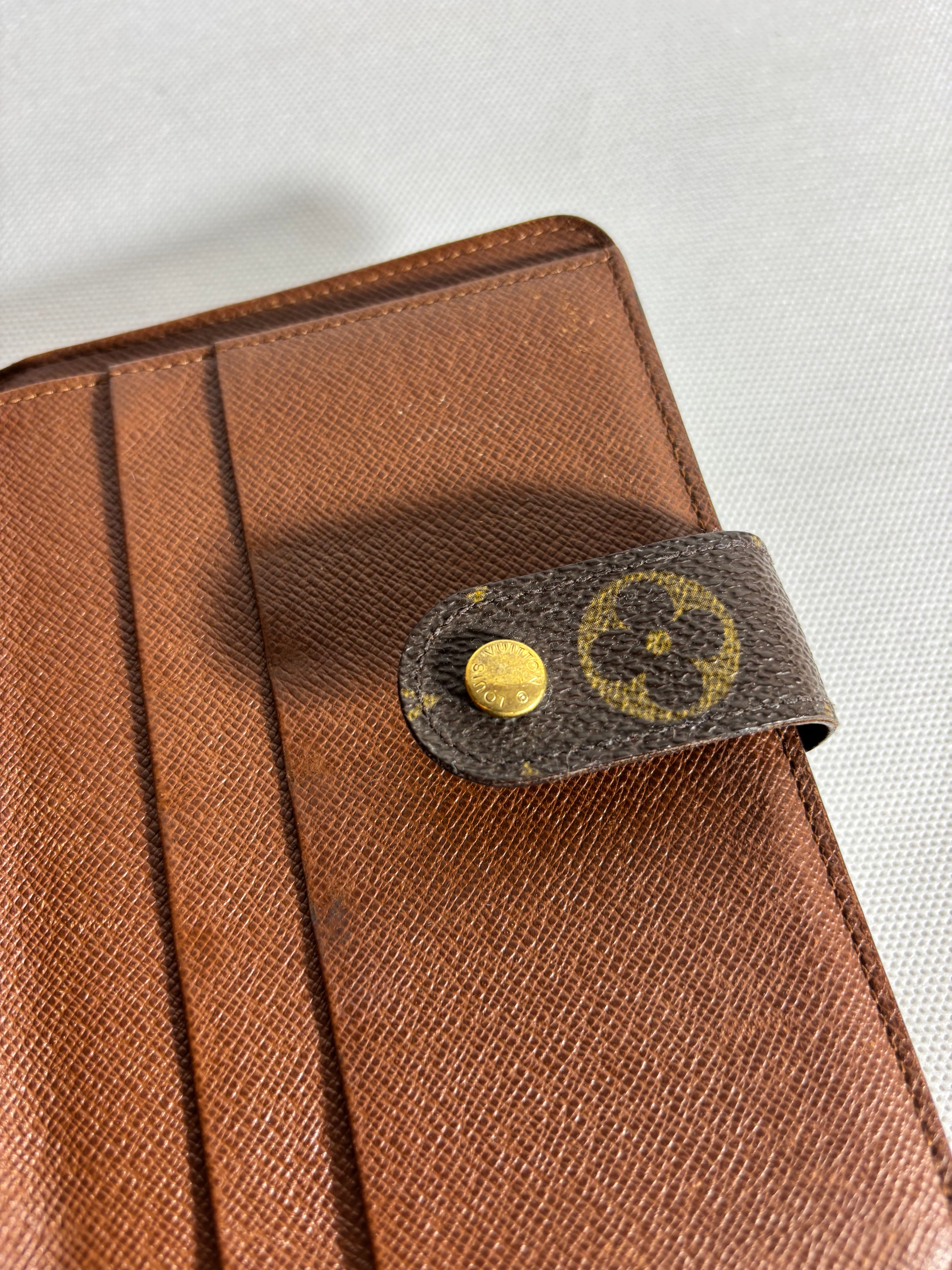 Portefeuille compact zippé monogram à deux volets Grande taille Louis Vuitton