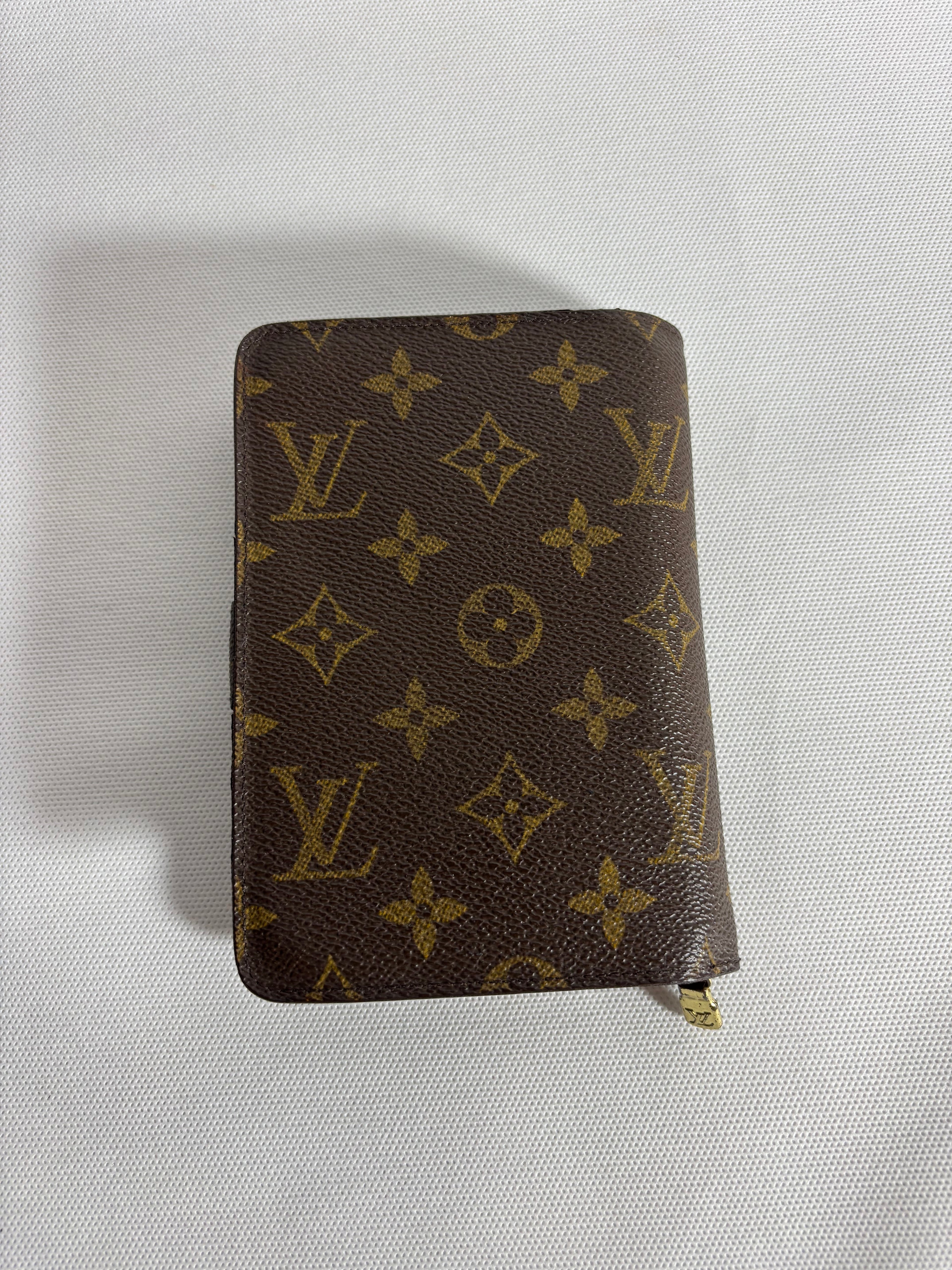 Portefeuille compact zippé monogram à deux volets Grande taille Louis Vuitton