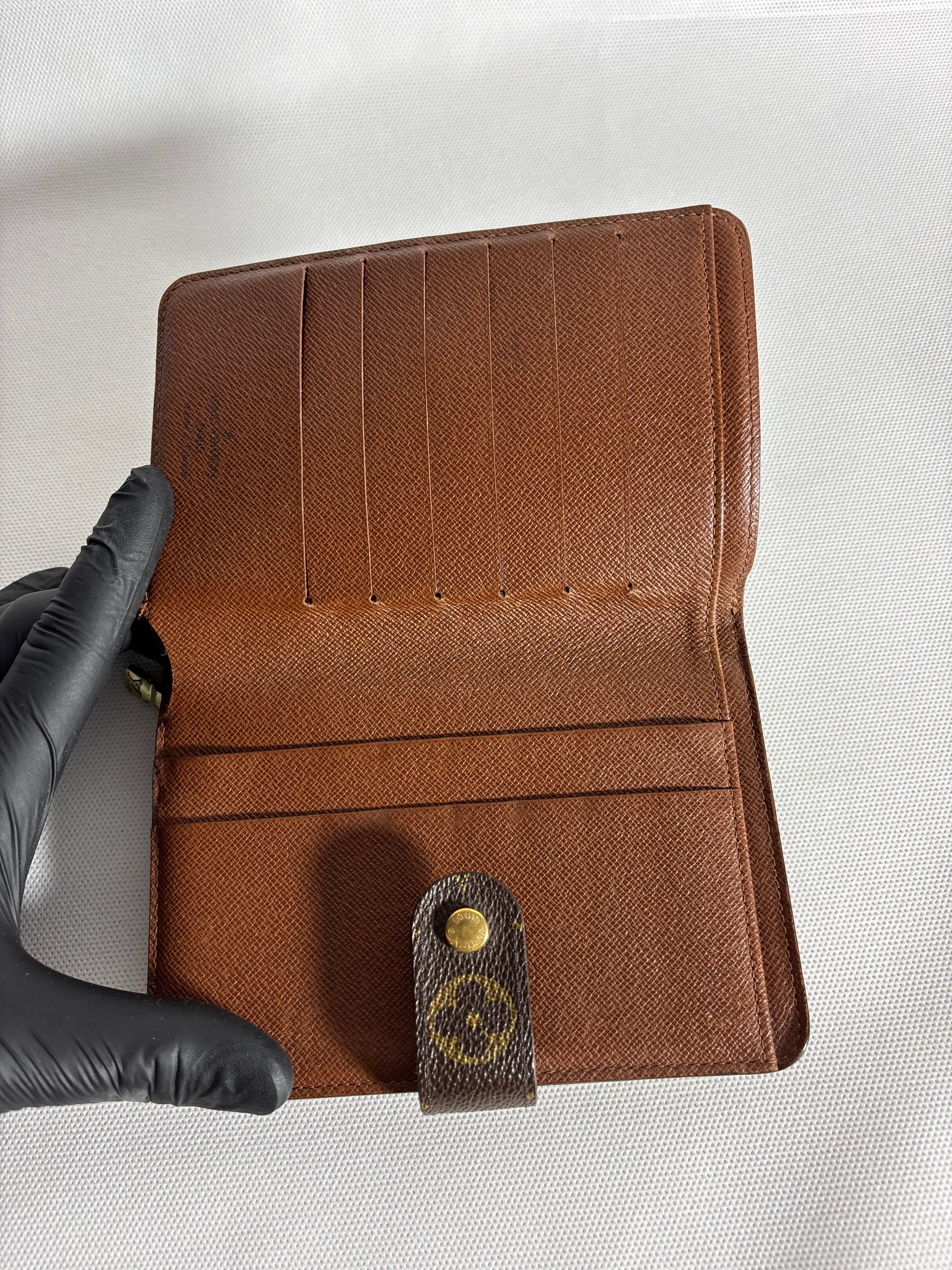 Portefeuille compact zippé monogram à deux volets Grande taille Louis Vuitton