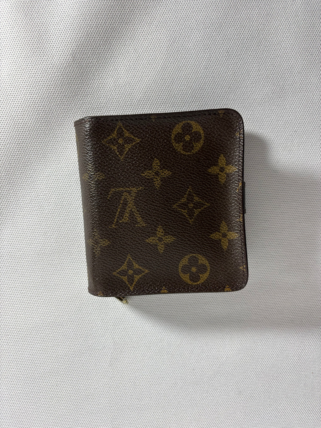 Portefeuille compact zippé monogram à deux volets Louis Vuitton