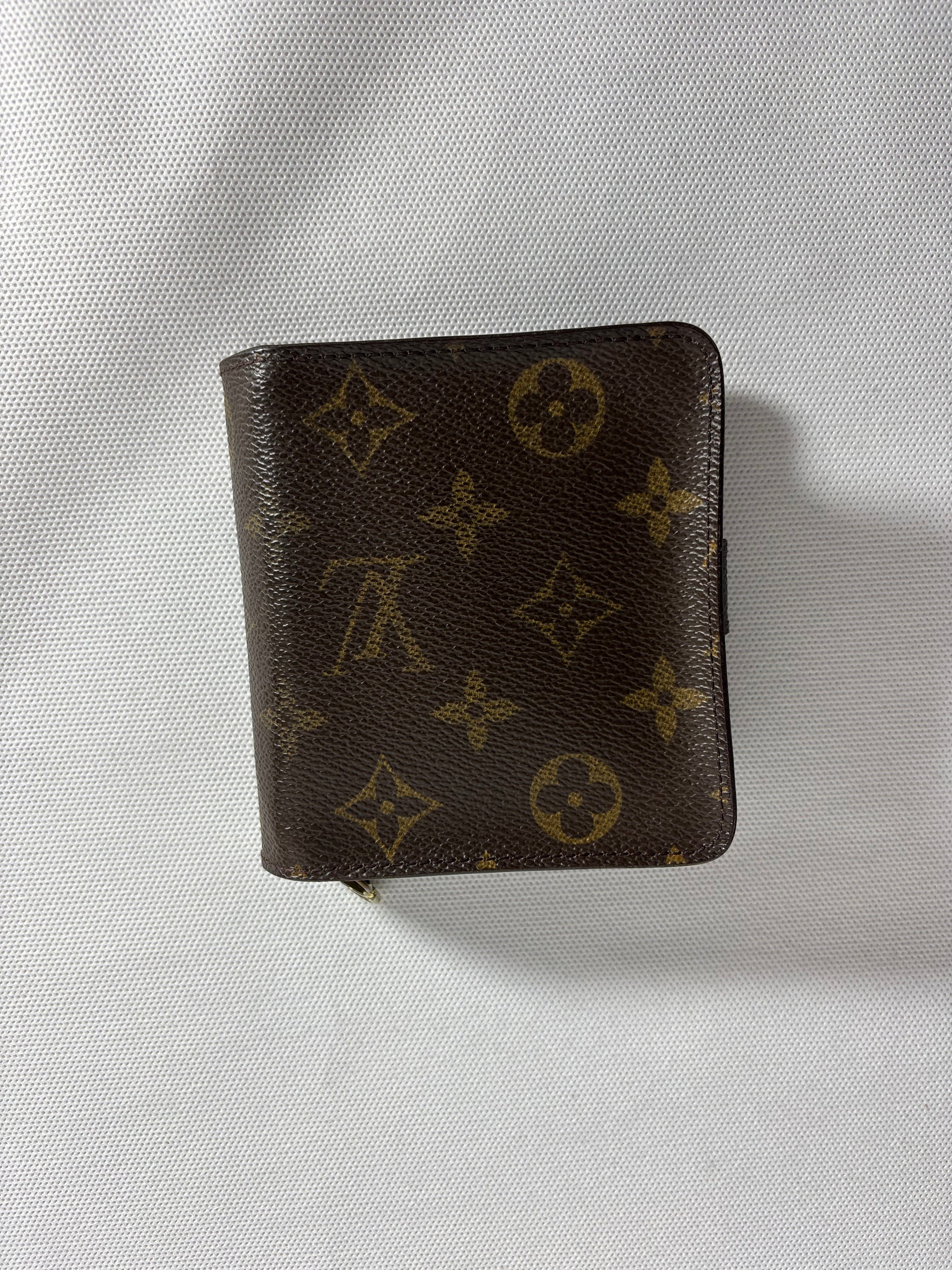 Portefeuille compact zippé monogram à deux volets Louis Vuitton